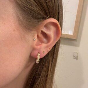 The Caterina huggie gold hoop Pearl earrings twist braided